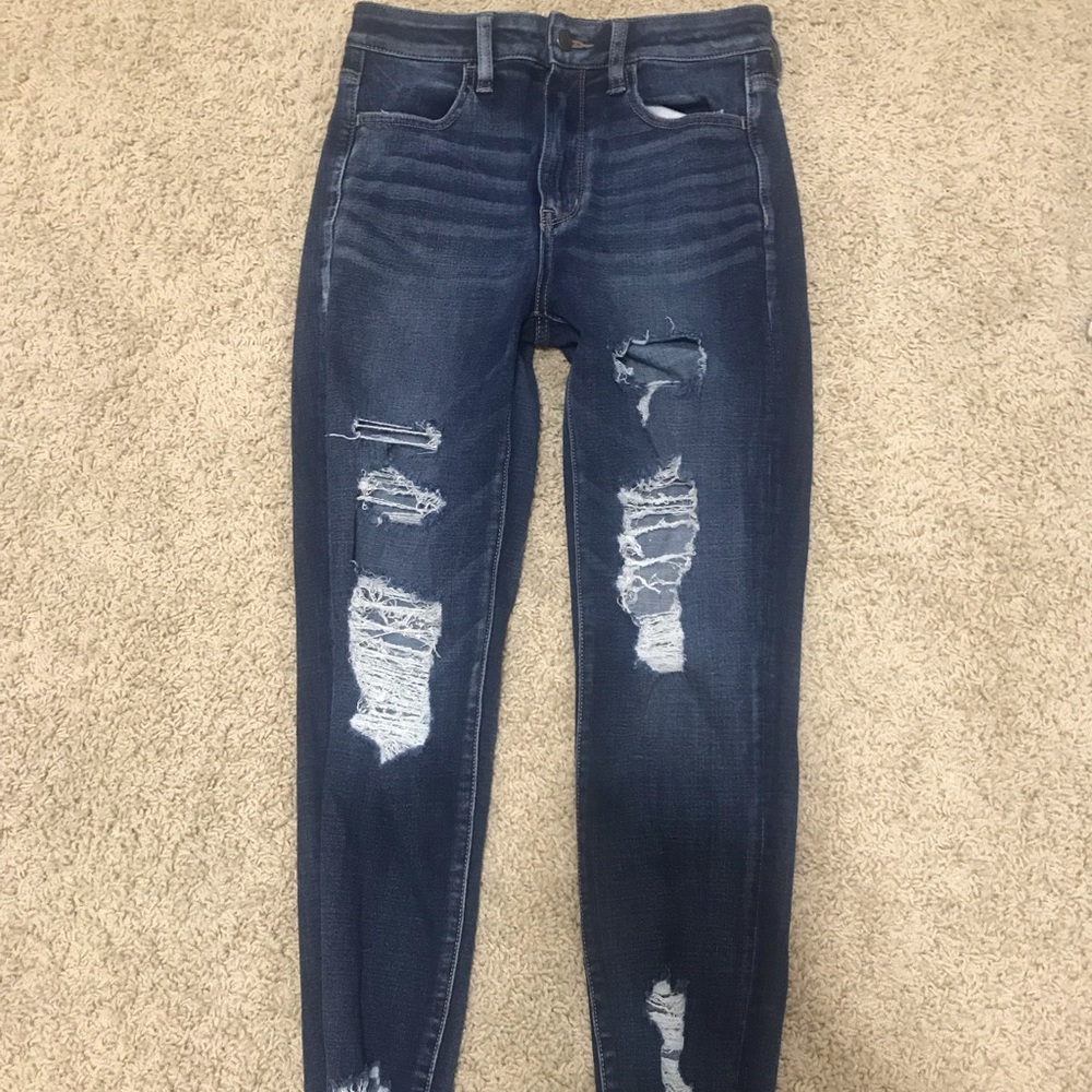 Super distressed high rise jeans